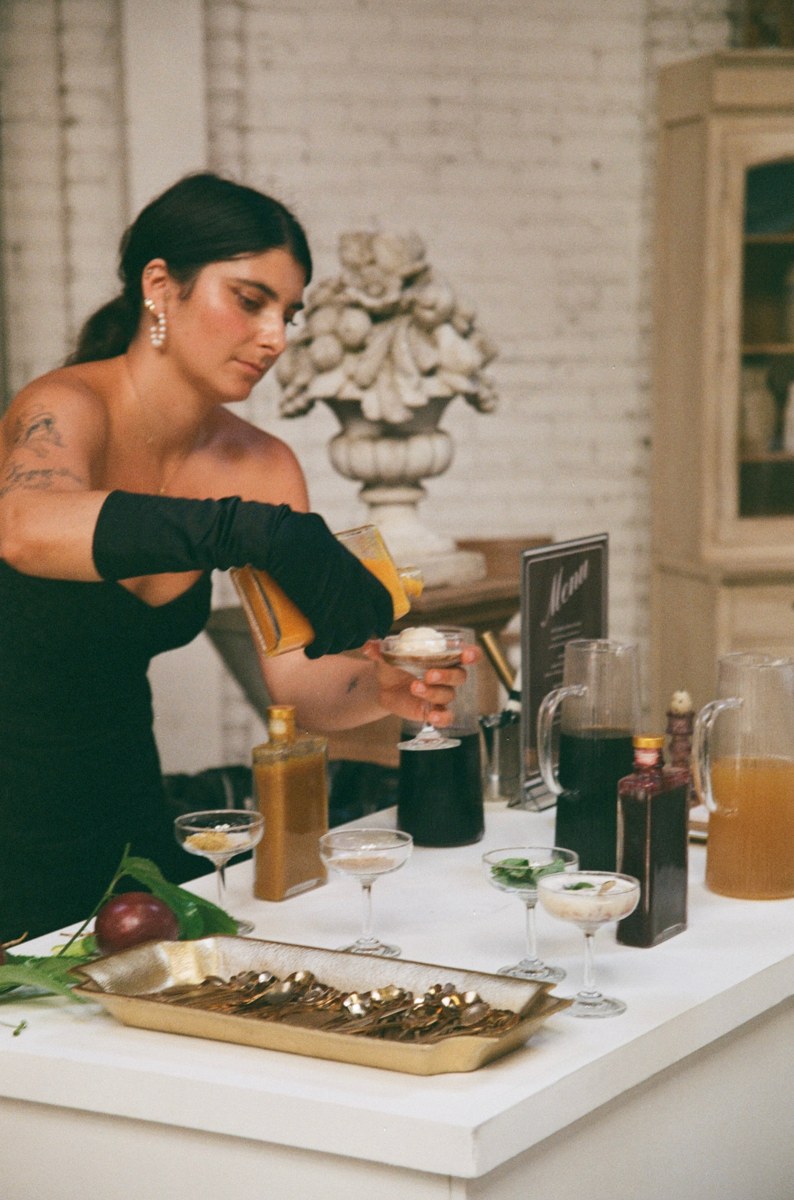 Kala pouring tea into a Fogato coupe
