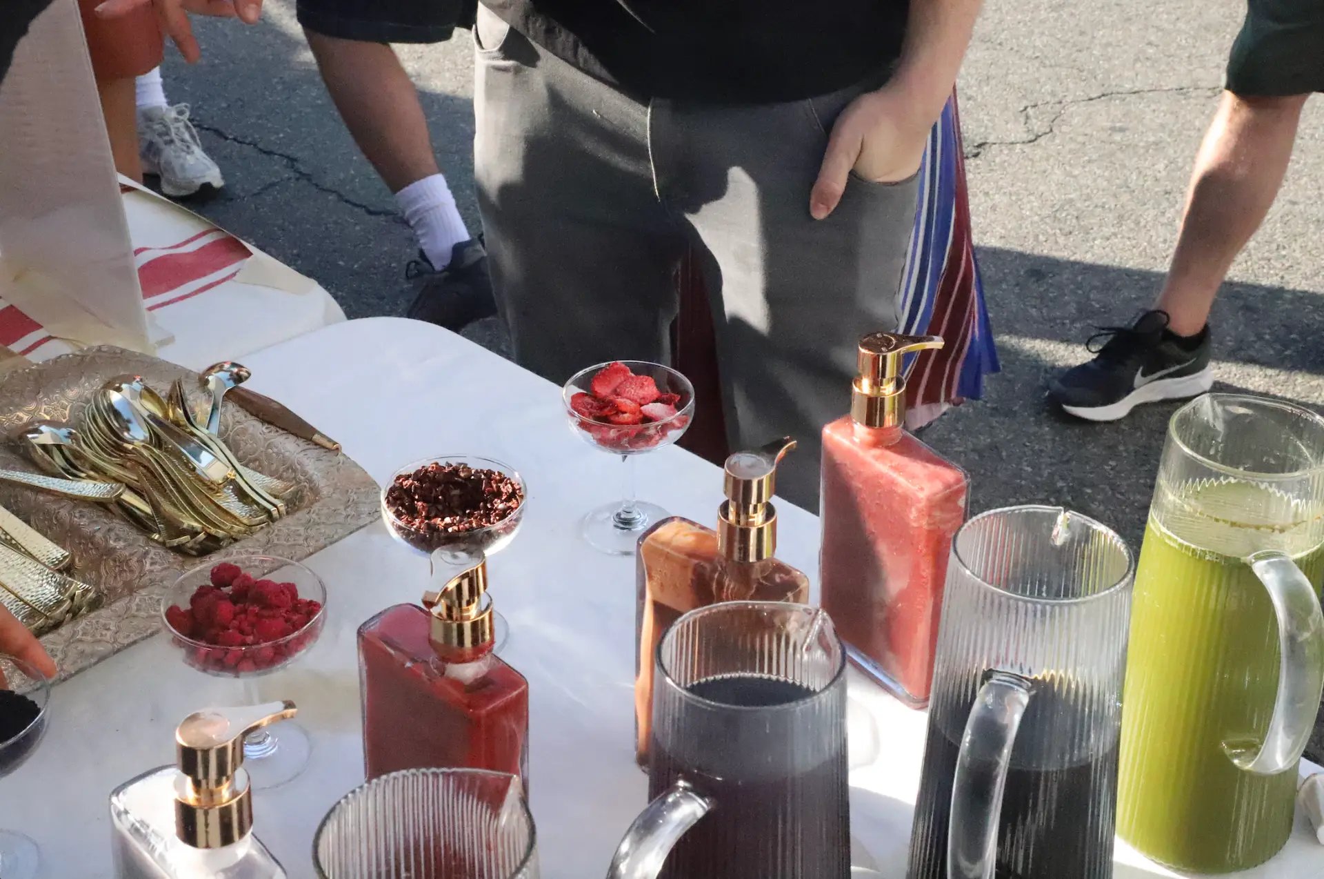 A fully set Fogato beverage station with pitchers, syrups, and gold spoons at Blockprint in Venice